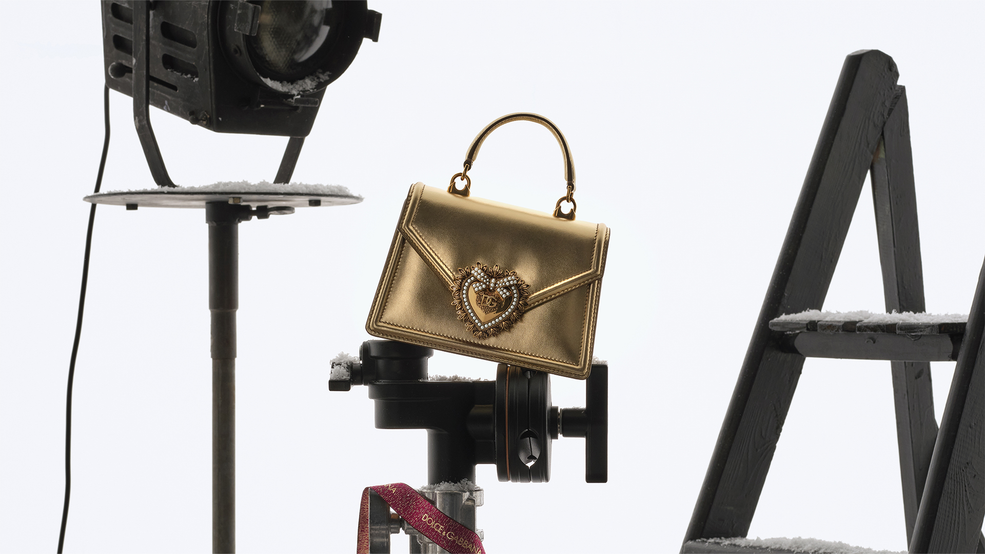 dolce-and-gabbana-holiday-campaign-2024-fashion-accessories-beauty-gift-finder-banner